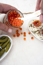 Wild Premium King Salmon Roe being served with mother-of-pearl spoon