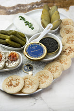 Royal Baerii Caviar served with blinis, crème fraîche and condiments
