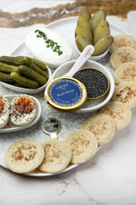 Royal Beluga Caviar served with blinis, crème fraîche and condiments