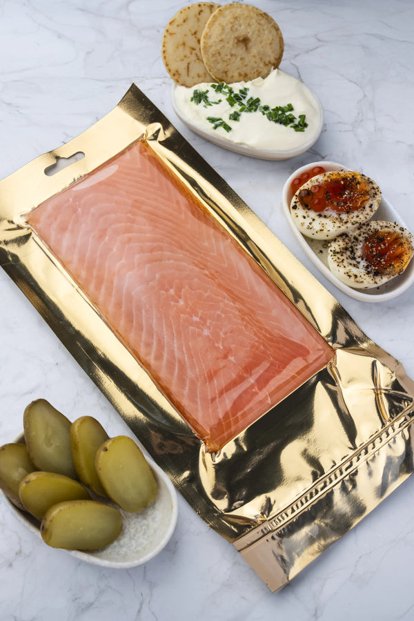 Premium Smoked Salmon served with blinis, crème fraîche and condiments